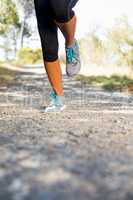 Close up woman runners legs running