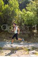 Profile view of woman jogging