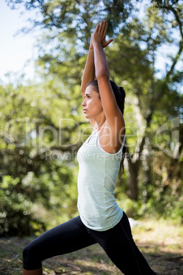 Profile view of woman doing yoga