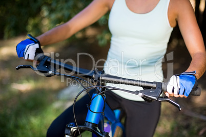 Close up of womans bust on a bike