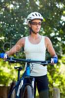 Woman unsmiling posing with her bike