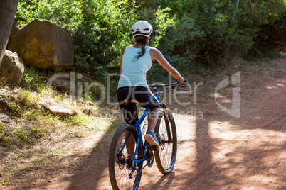 Woman front the back riding bike