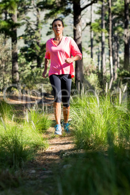 Sporty woman is running