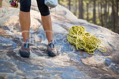 Close up climbers foot with rope