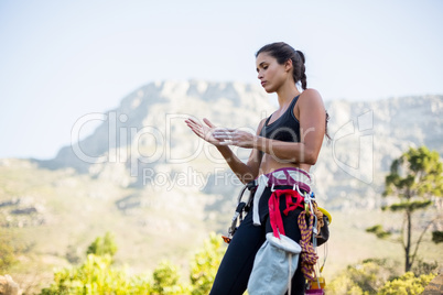 Woman preparing rock climbing