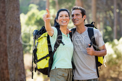 Couple pointing and hiking