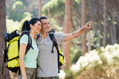 Couple pointing and hiking