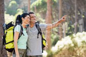 Couple pointing and hiking