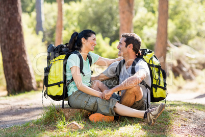 Couple sitting and holding each other