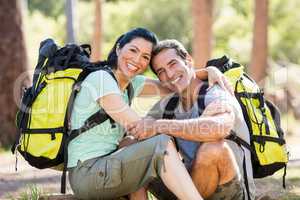 Couple sitting and holding each other