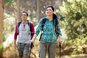 Couple smiling and hiking