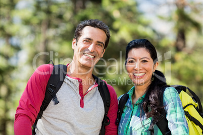 Portrait of couple smiling during a hike