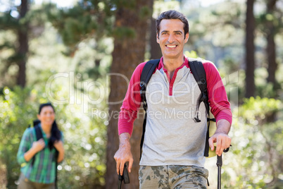 Man smiling and hiking