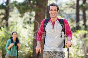 Man smiling and hiking
