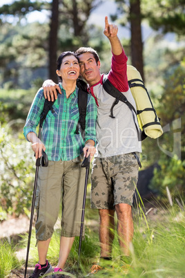 Couple pointing during a hike