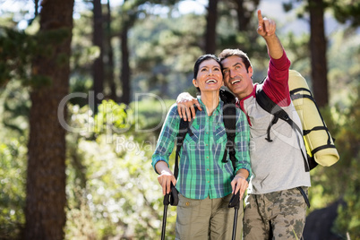 Couple pointing and hiking