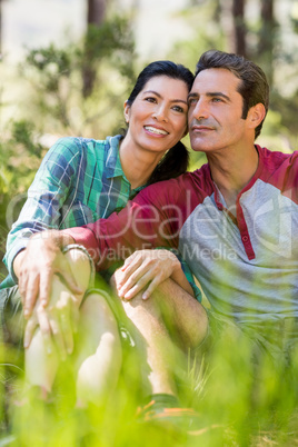 Couple sitting and holding each other