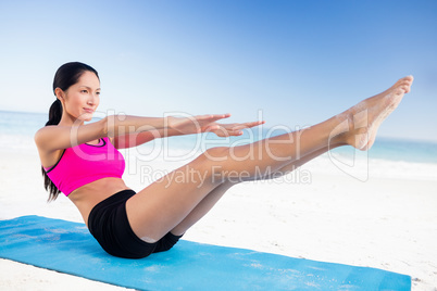 Fit woman doing yoga