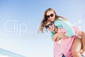 Happy couple posing on the beach