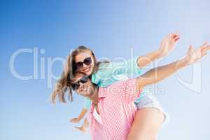 Happy couple posing on the beach