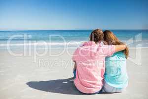 Happy couple posing on the beach