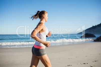 Fit woman on the beach