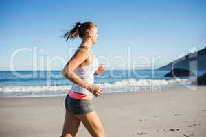 Fit woman on the beach