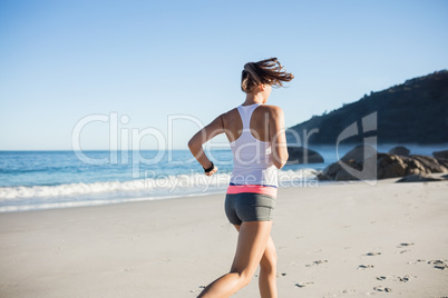 Fit woman on the beach