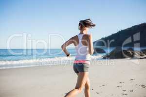 Fit woman on the beach