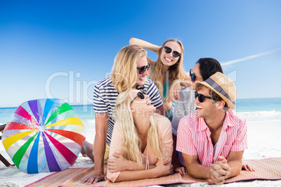 Portrait of friends posing at the beach