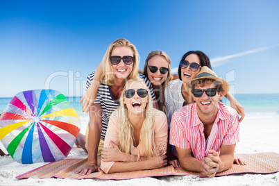 Portrait of friends posing at the beach