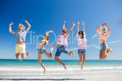 Portrait of friends posing at the beach