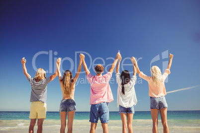 Portrait of friends posing at the beach