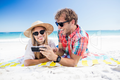 Portrait of couple posing at the beach