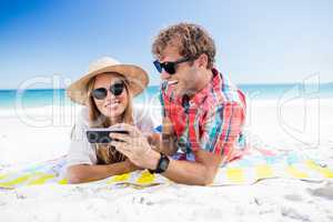 Portrait of couple posing at the beach