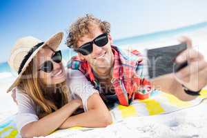 Portrait of couple posing at the beach