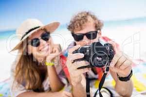 Portrait of couple posing at the beach