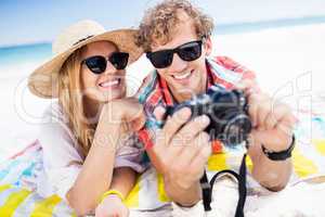 Portrait of couple posing at the beach