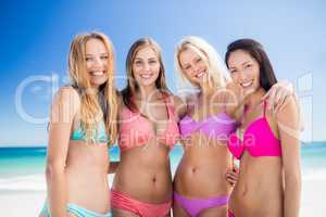 Portrait of friends posing at the beach