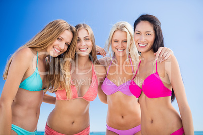 Portrait of friends posing at the beach