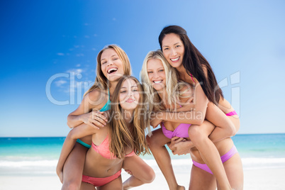 Portrait of friends posing at the beach