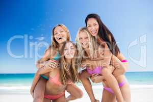 Portrait of friends posing at the beach