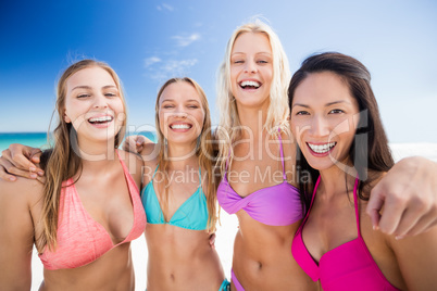 Portrait of friends posing at the beach