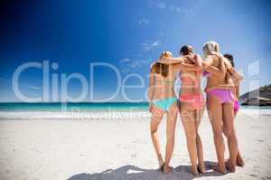 Portrait of friends posing at the beach