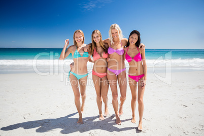 Portrait of friends posing at the beach