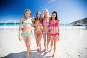 Portrait of friends posing at the beach