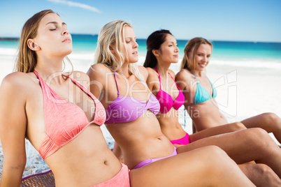 Portrait of friends posing at the beach