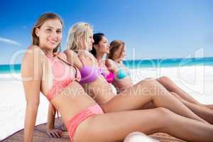 Portrait of friends posing at the beach