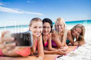 Portrait of friends posing at the beach