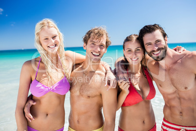 Portrait of friends posing at the beach